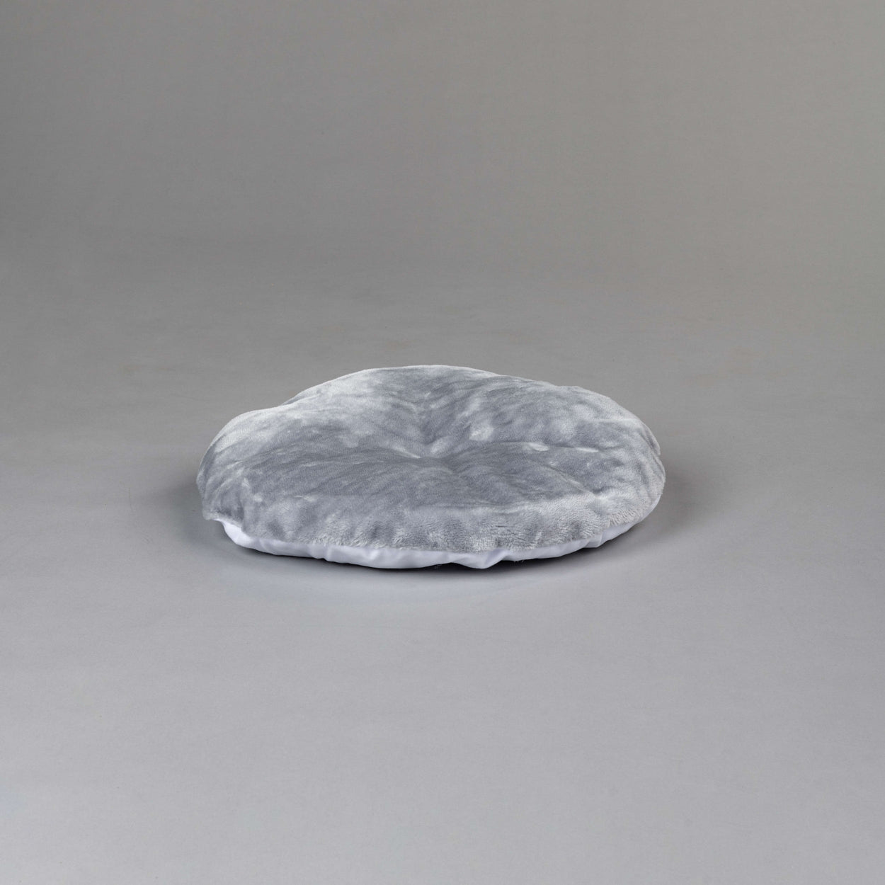 Grey round outlet cushion